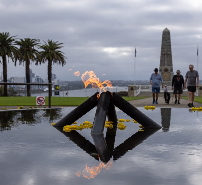 The State War Memorial and a flame